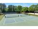 Enjoy friendly competition on the pickleball courts, surrounded by well-maintained landscaping at 4035 Regal Oaks Dr, Suwanee, GA 30024