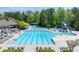 Spacious swimming pool with lap lanes, waterslides and lounge area for residents at 4035 Regal Oaks Dr, Suwanee, GA 30024