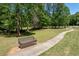 Enjoy a scenic walk along the community's winding path, surrounded by lush greenery and trees at 4035 Regal Oaks Dr, Suwanee, GA 30024