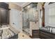 Bathroom featuring a glass shower, marble counters, and a soaking tub with natural light at 454 Langley Oaks Dr, Marietta, GA 30067