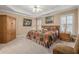 Bedroom featuring neutral walls, carpeted floors, and a comfortable queen-size bed at 454 Langley Oaks Dr, Marietta, GA 30067