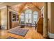 Comfortable room with wood floors, sitting chair, and views from the large windows at 454 Langley Oaks Dr, Marietta, GA 30067