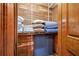 Cedar closet with organized shelving to maximize storage space, featuring wooden door at 454 Langley Oaks Dr, Marietta, GA 30067