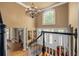 Grand foyer features a chandelier, staircase, and views into the home's interior at 454 Langley Oaks Dr, Marietta, GA 30067