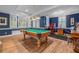 Game room boasting a pool table, hardwood floors, and bright natural lighting at 454 Langley Oaks Dr, Marietta, GA 30067