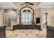 Luxurious main bathroom with a soaking tub, walk-in shower, and stylish fixtures at 454 Langley Oaks Dr, Marietta, GA 30067