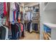 Organized walk-in closet with hanging clothes, shelving, and plenty of storage space at 454 Langley Oaks Dr, Marietta, GA 30067