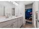 Double vanity bathroom with granite countertops and decorative lighting at 4702 Jellico Dr, Powder Springs, GA 30127