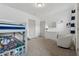 Cozy bedroom with a bunk bed and a dresser with mirror at 4702 Jellico Dr, Powder Springs, GA 30127
