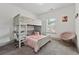 Cozy bedroom featuring bunk beds, plush carpet, and plenty of space at 4702 Jellico Dr, Powder Springs, GA 30127