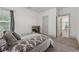 Bedroom with neutral carpet, a view of another room, and natural light at 4702 Jellico Dr, Powder Springs, GA 30127