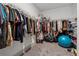 Walk-in closet with wire shelving and plenty of storage space at 4702 Jellico Dr, Powder Springs, GA 30127