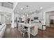 Modern kitchen featuring a large center island with seating and stainless steel appliances and fixtures at 4702 Jellico Dr, Powder Springs, GA 30127