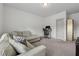 Cozy living room with a couch, desk, and shelving unit at 4702 Jellico Dr, Powder Springs, GA 30127