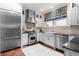 Bright kitchen featuring stainless steel appliances, Wolf range and granite counters at 557 E Wesley Ne Rd, Atlanta, GA 30305