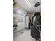 Well-organized walk-in closet with metal shelving and a view of the exterior at 6725 Polo Dr, Cumming, GA 30040