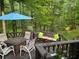 Outdoor back deck with seating area for entertaining at 989 Pinfeather Ct, Lawrenceville, GA 30043
