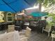 Wood deck with chairs and outdoor dining with railing at 989 Pinfeather Ct, Lawrenceville, GA 30043