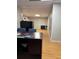 Office space with wood-look flooring and ample room for chairs and storage at 989 Pinfeather Ct, Lawrenceville, GA 30043
