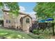 View of the home exterior showcasing multi-level deck perfect for entertaining in wooded private setting at 989 Pinfeather Ct, Lawrenceville, GA 30043