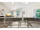 Kitchen sink features granite countertops, a stainless steel faucet, and plenty of counter space at 989 Pinfeather Ct, Lawrenceville, GA 30043