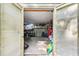 This practical storage shed boasts double doors, concrete floor, and plenty of wall mounted shelving at 989 Pinfeather Ct, Lawrenceville, GA 30043