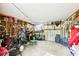 This storage shed boasts a concrete floor and convenient wall mounted shelving for storing tools and equipment at 989 Pinfeather Ct, Lawrenceville, GA 30043