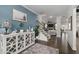 Welcoming foyer with beautiful wood floors, a staircase, stylish decor, and a view into the living room at 146 Citrine Way, Acworth, GA 30101
