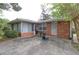 Backyard patio area, featuring a brick exterior with a door and windows at 3257 Greenvale Way, Decatur, GA 30034