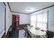 Traditional dining area with tiled floor, accented by natural light and a door which leads to the laundry room at 3257 Greenvale Way, Decatur, GA 30034