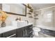 Modern bathroom featuring floating shelves, a vessel sink, and glass shower with tiled walls at 3481 Lakeside Dr # 601, Atlanta, GA 30326