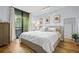 Bright and airy bedroom with a private balcony, natural light, and neutral decor at 3481 Lakeside Dr # 601, Atlanta, GA 30326