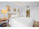 Serene bedroom with neutral tones, wood-look flooring, and an ensuite bathroom at 3481 Lakeside Dr # 601, Atlanta, GA 30326