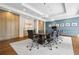 A spacious conference room with a large table, comfortable chairs, and ample storage at 3481 Lakeside Dr # 601, Atlanta, GA 30326