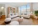 Bright living room featuring a large window, plush sofa, and stylish decor at 3481 Lakeside Dr # 601, Atlanta, GA 30326