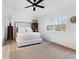 Bright bedroom with a neutral palette, large window, and minimalist decor for a serene feel at 384 Teal Ct, Roswell, GA 30076