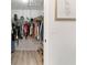 Walk-in closet with wire shelving and plenty of storage space for clothes and shoes at 384 Teal Ct, Roswell, GA 30076