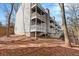 Exterior view of the rear of the building and private balconies at 384 Teal Ct, Roswell, GA 30076