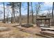 Outdoor gazebo and picnic area amidst mature trees and natural setting at 384 Teal Ct, Roswell, GA 30076