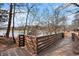 Wooden bridge with a lake view surrounded by trees and nature at 384 Teal Ct, Roswell, GA 30076