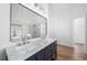 Elegant bathroom with double vanity, marble countertops, and a large mirror at 3850 Laurel Nw Dr, Acworth, GA 30101