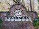 Brick monument sign at the Fairway Station community entrance at 3850 Laurel Nw Dr, Acworth, GA 30101