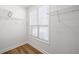 Walk-in closet featuring shelving and a window for natural light at 3850 Laurel Nw Dr, Acworth, GA 30101