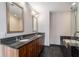 Bathroom features granite countertops, dual sinks, framed mirrors, and a soaking tub with tiled surround at 1080 Peachtree Ne St # 2515, Atlanta, GA 30309