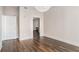 Bedroom showcasing gleaming hardwood floors and modern lighting fixture, with an ensuite bathroom at 1080 Peachtree Ne St # 2515, Atlanta, GA 30309