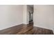 Neutral bedroom with wood flooring and sliding mirrored closet doors at 1080 Peachtree Ne St # 2515, Atlanta, GA 30309