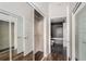 Mirrored closet doors with shelving near the bathroom at 1080 Peachtree Ne St # 2515, Atlanta, GA 30309