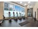 Bright fitness center with floor-to-ceiling windows and state-of-the-art exercise equipment at 1080 Peachtree Ne St # 2515, Atlanta, GA 30309