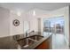Modern kitchen island with granite countertop and view of the city skyline at 1080 Peachtree Ne St # 2515, Atlanta, GA 30309
