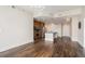 An open concept living space with a kitchen island and hard wood floors at 1080 Peachtree Ne St # 2515, Atlanta, GA 30309